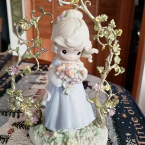 Precious moments 'in God's beautiful garden of love"